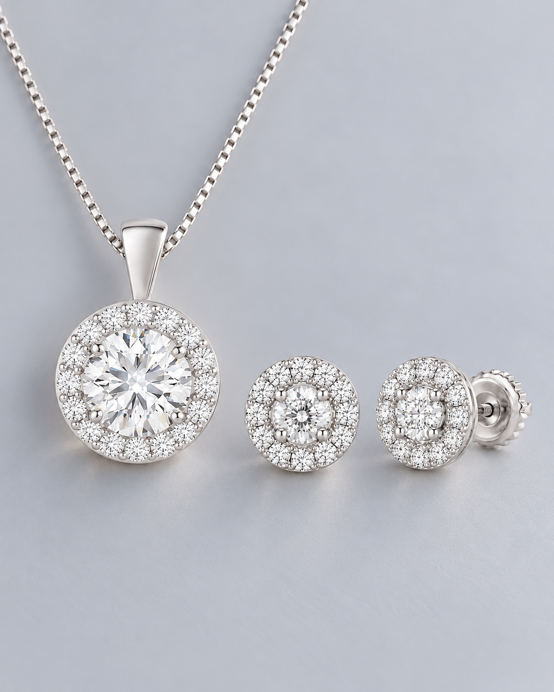 Halo moissanite necklace with matching halo stud earrings in white gold